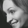 Headshot of a smiling woman named Ana, a practitioner.
